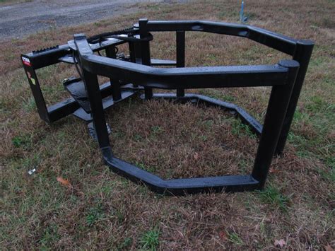 skid steer round bale squeeze|skid steer hay bale attachment.